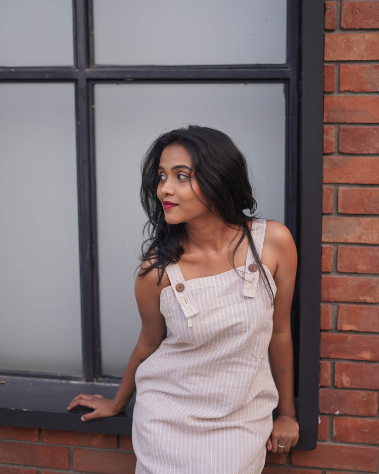Vestures dress in biege color with Lacey Pearl strips Pinafore 