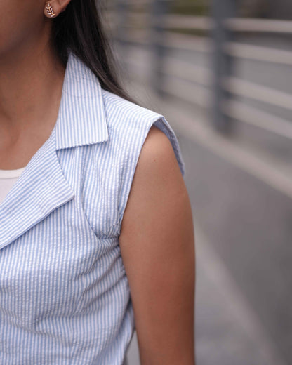Close-up of the left shoulder showcasing the open-shoulder cut and stylish clean design of the Anki Jumpsuit.