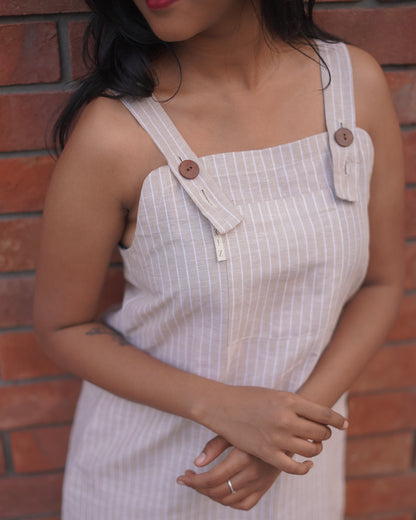 Right-side close-up of a Cozy One-Piece Pinafore in Lacey Pearl, emphasizing the refined craftsmanship and breathable linen cotton fabric.