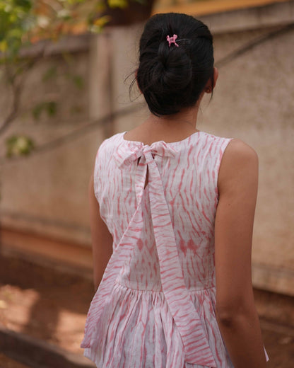 Right-side back shot of the Vil Top, showcasing its breathable Mul Mul Cotton fabric and unique double-layered design.